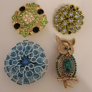 Blue and green brooches